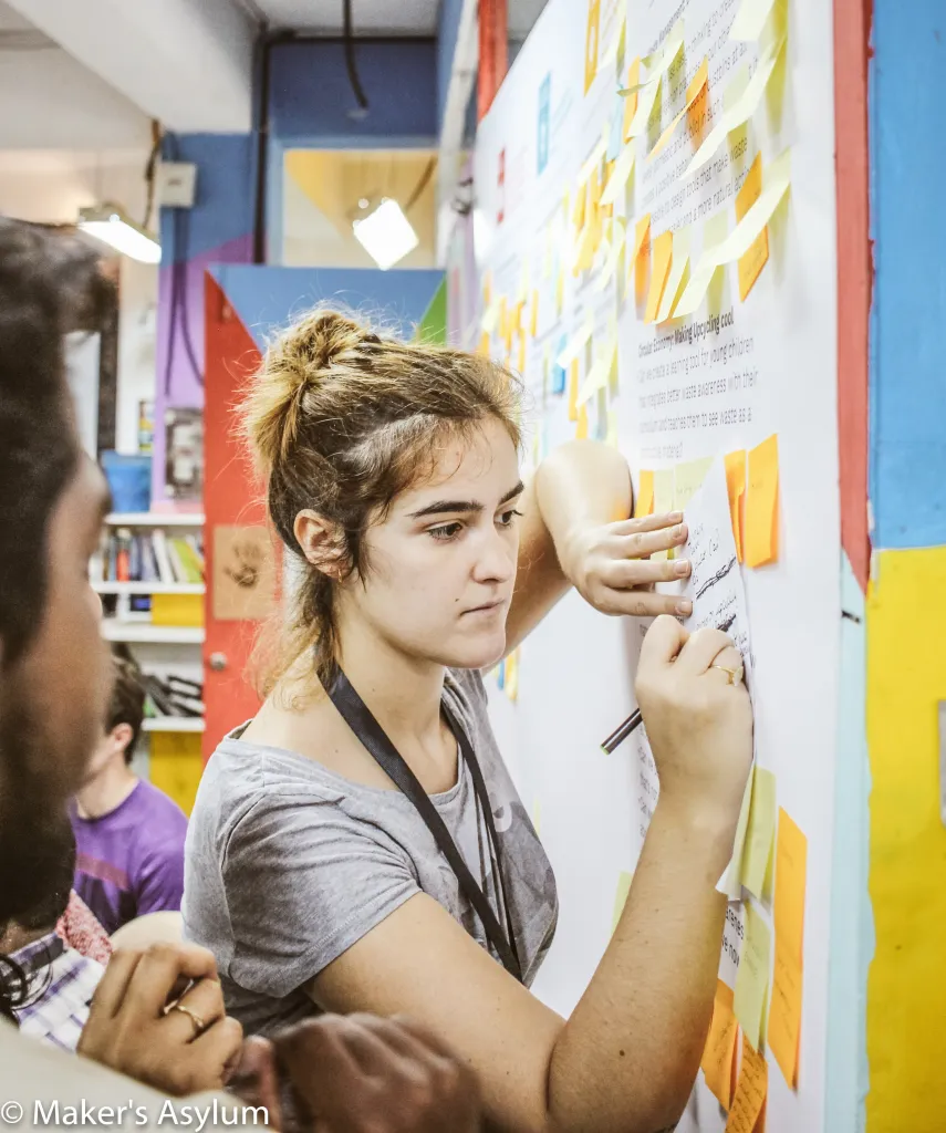 Man climbing bar chart